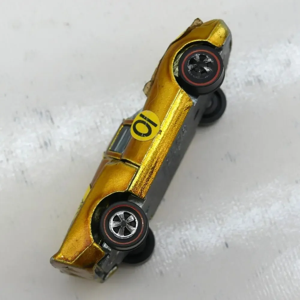 VTG 1968 Mattel Hot Wheels Lola GT-70 Gold Redline Diecast Car w/ Sticker